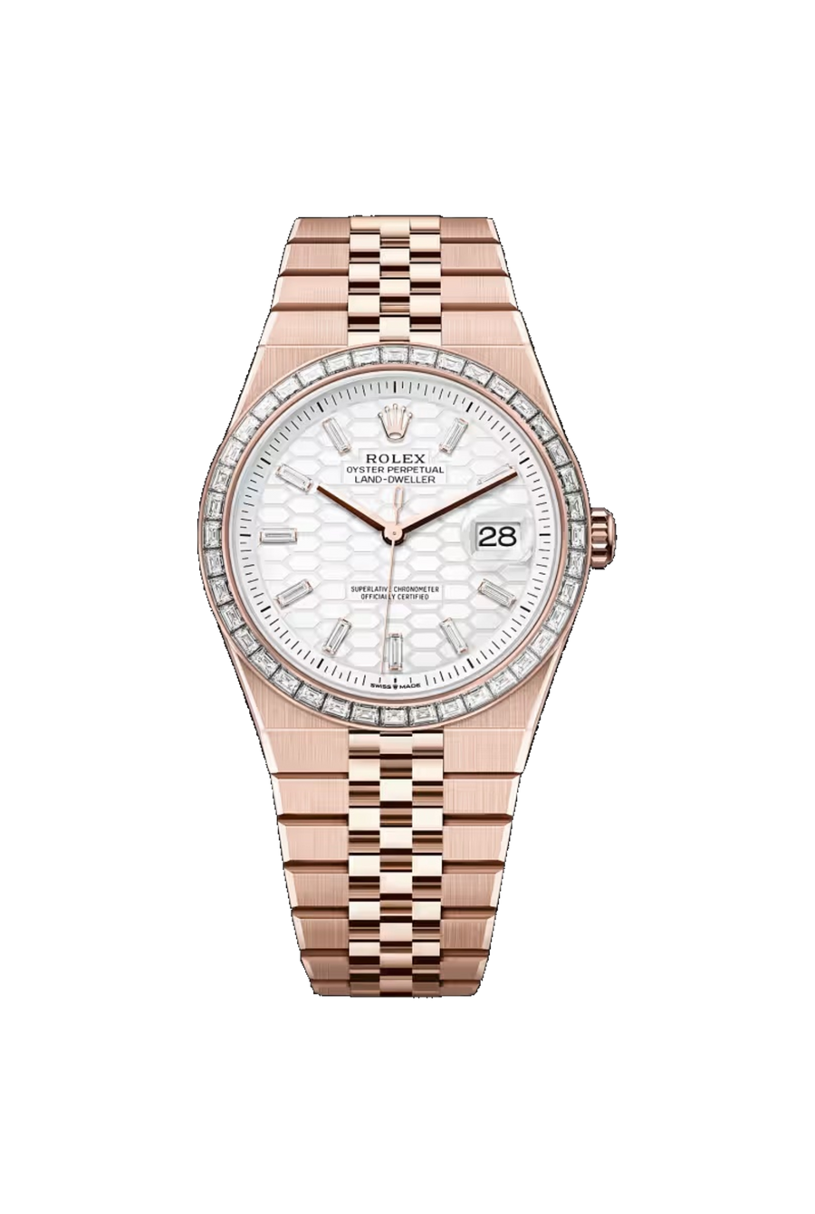 Rolex Land-Dweller 40 referencia 127385TBR, Oro Everose de 18K, Blanco intenso con motivo de panal e índices de diamante, bisel engastado con diamantes y brazalete Flat Jubilee.
